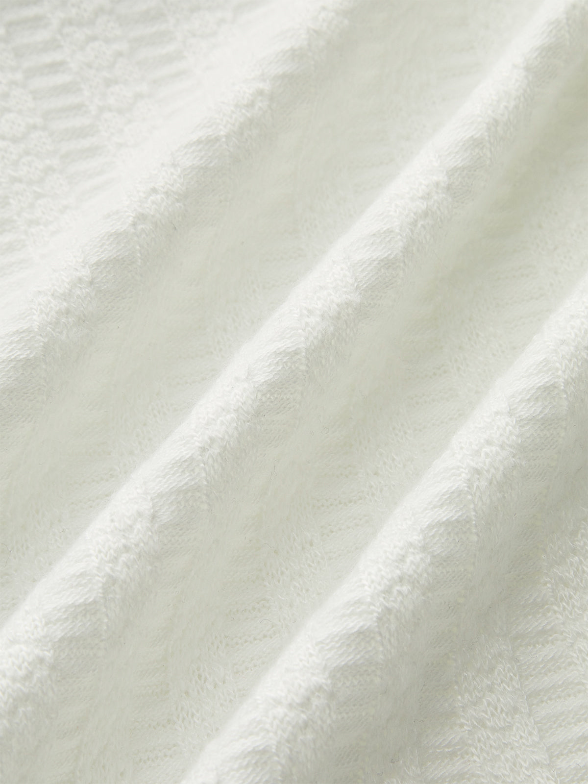 Minirock aus Strick mit Denim-Besatz und Metallknopf