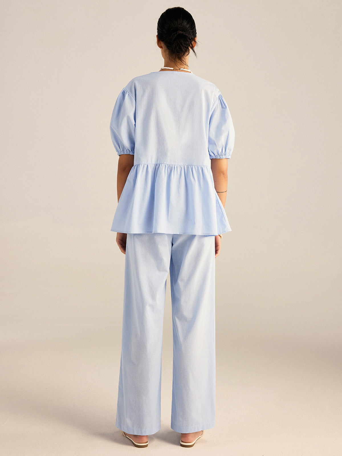 Ensemble haut péplum et pantalon en coton