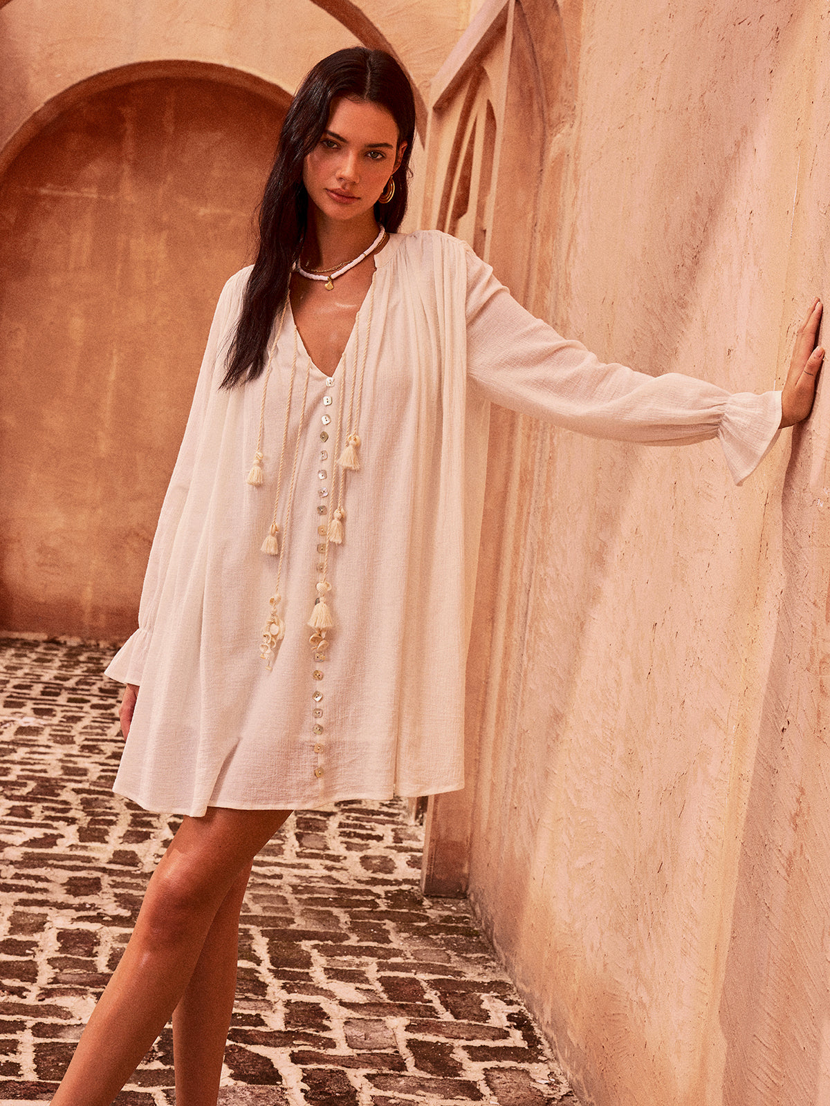 Mini-robe en coton boutonnée à pompons