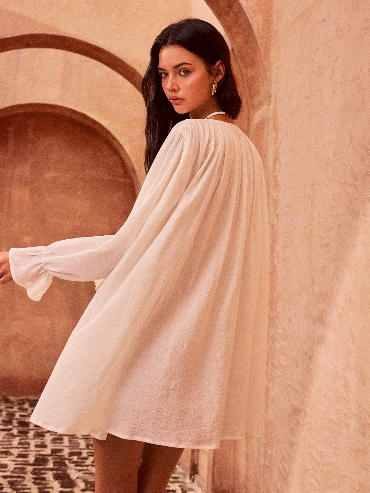 Mini-robe en coton boutonnée à pompons