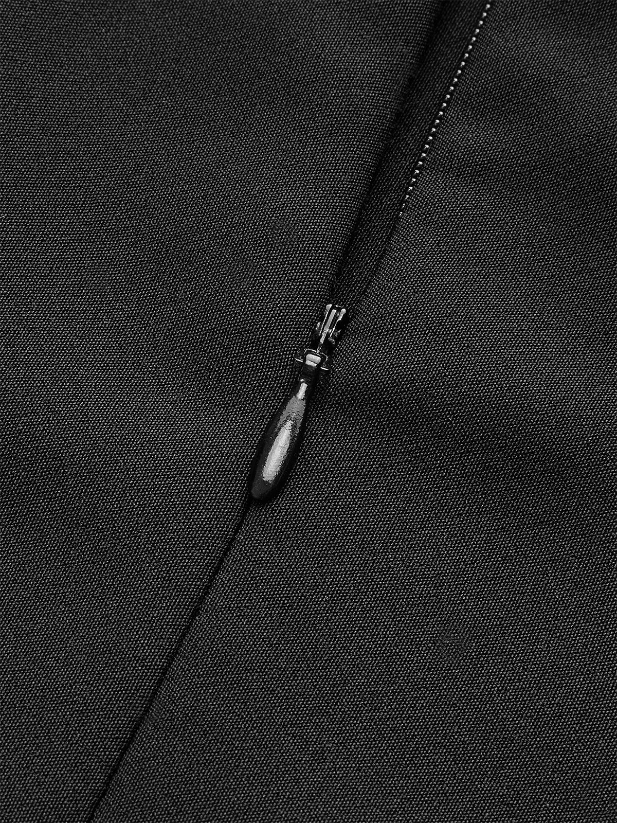 Robe dos nu à boutons métalliques