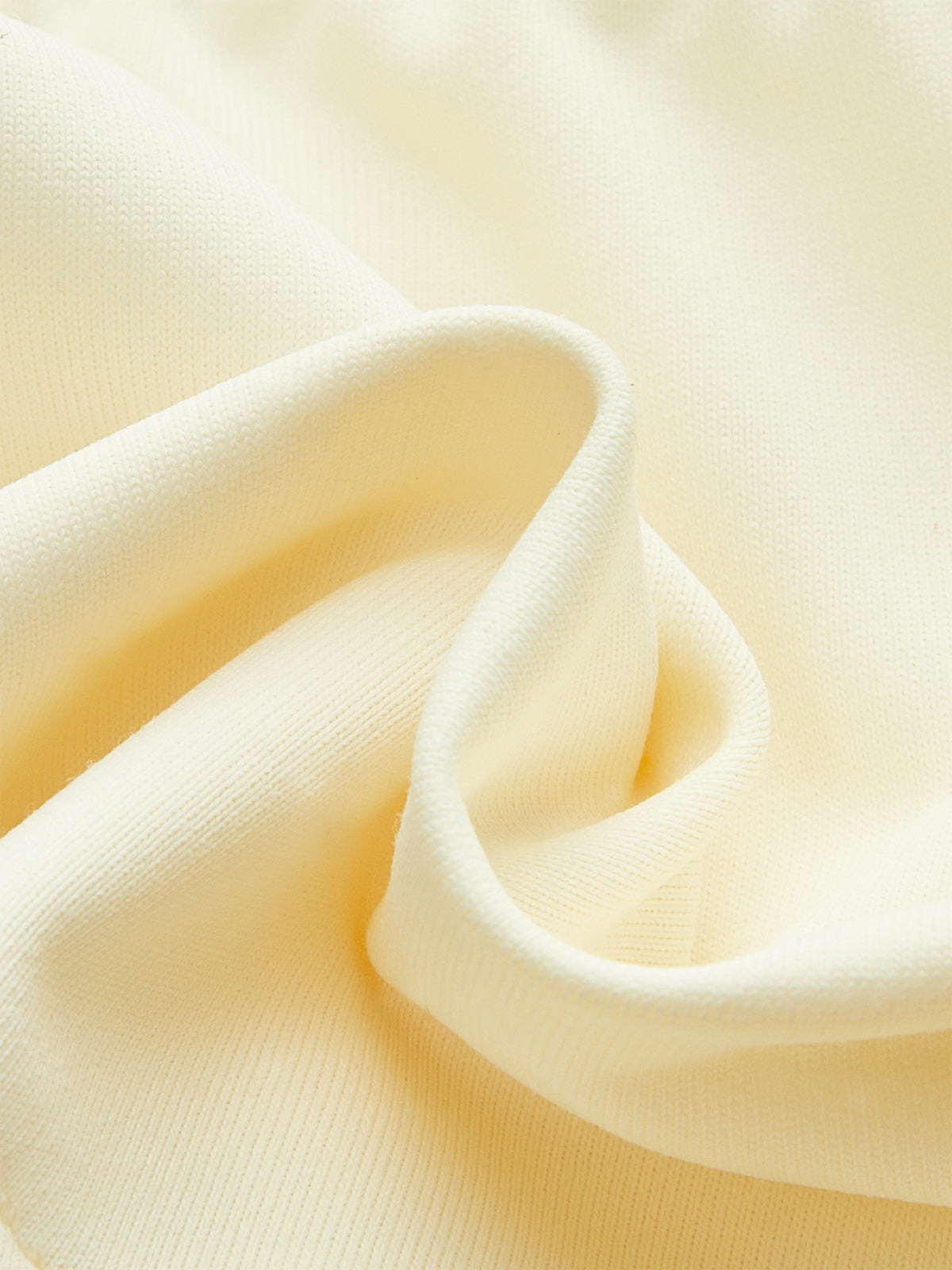 Ensemble haut court dos nu et jupe à empiècements en résille