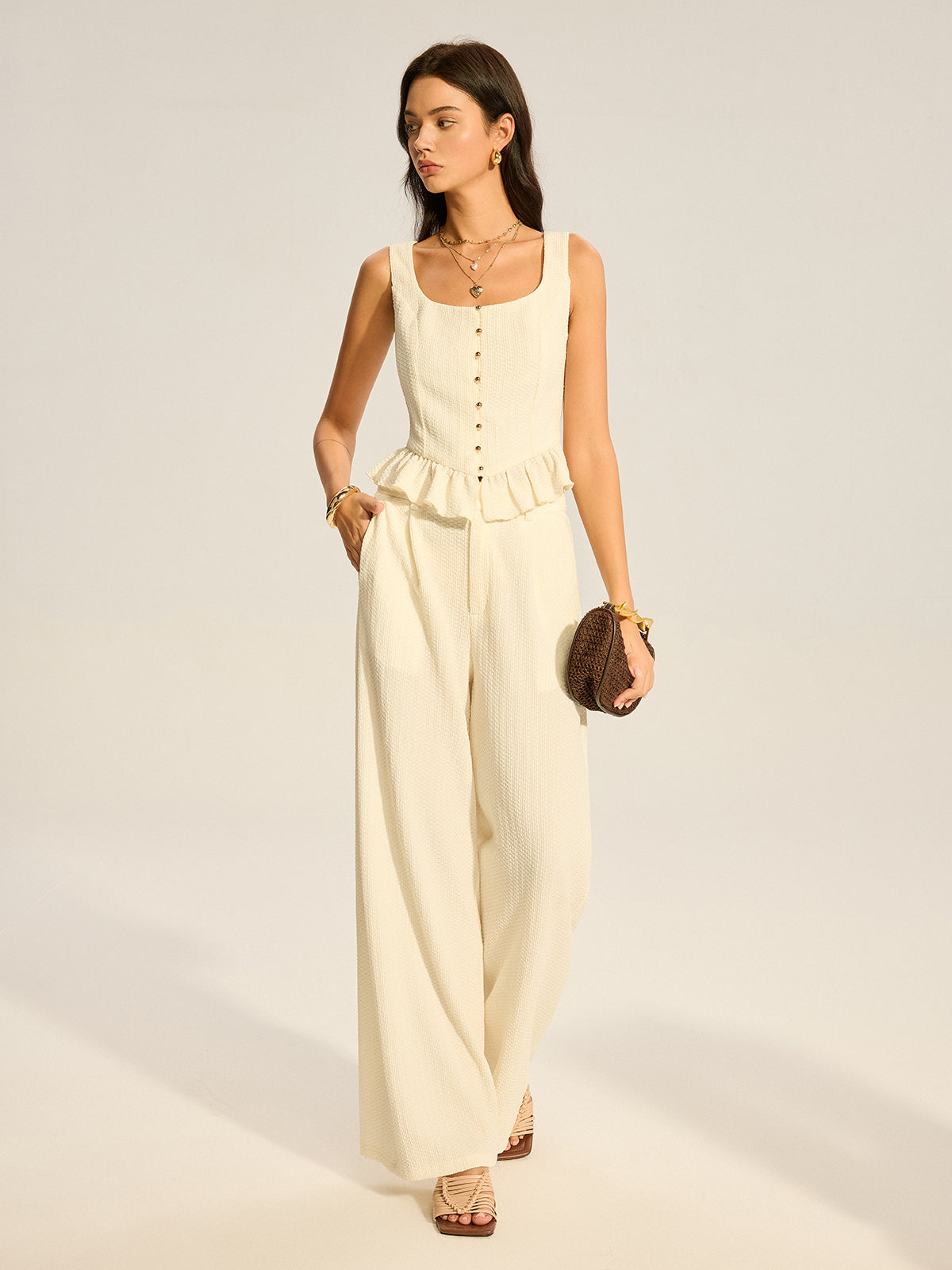 Ensemble haut péplum texturé et pantalon large