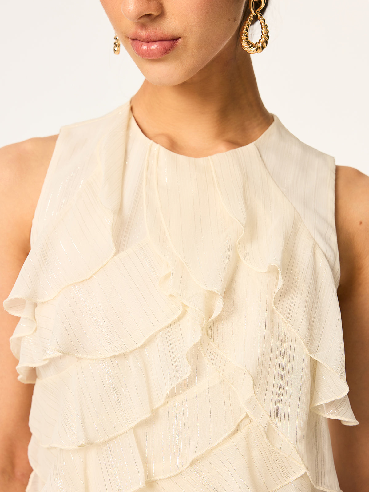 Halbtransparente ärmellose Chiffon-Tunika mit Rüschen