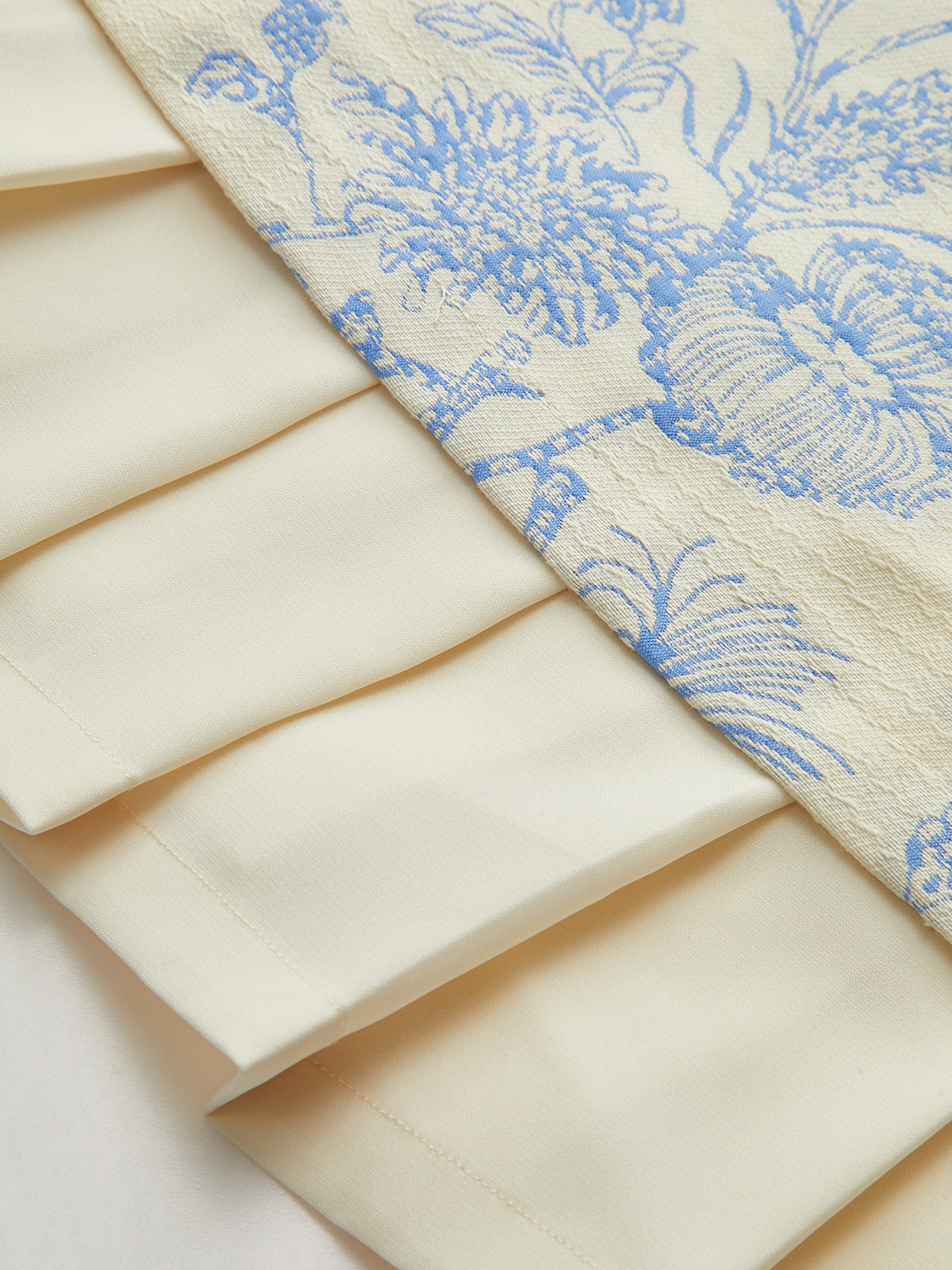 Robe sans manches à imprimé floral et ourlet plissé