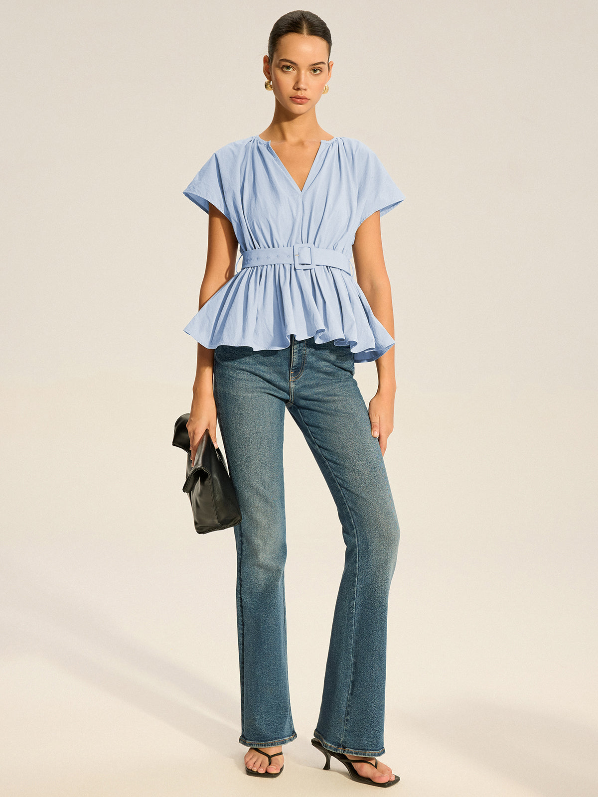 Haut peplum plissé à col en V ceinturé