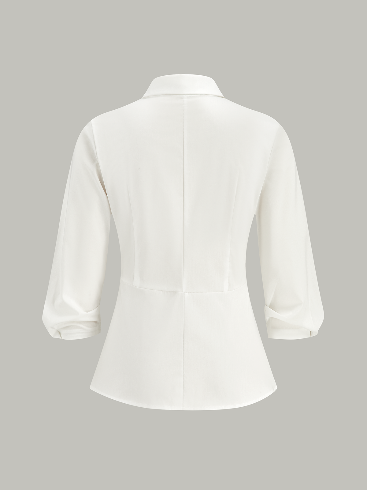 Chemise asymétrique cache-cœur avec boucle métallique