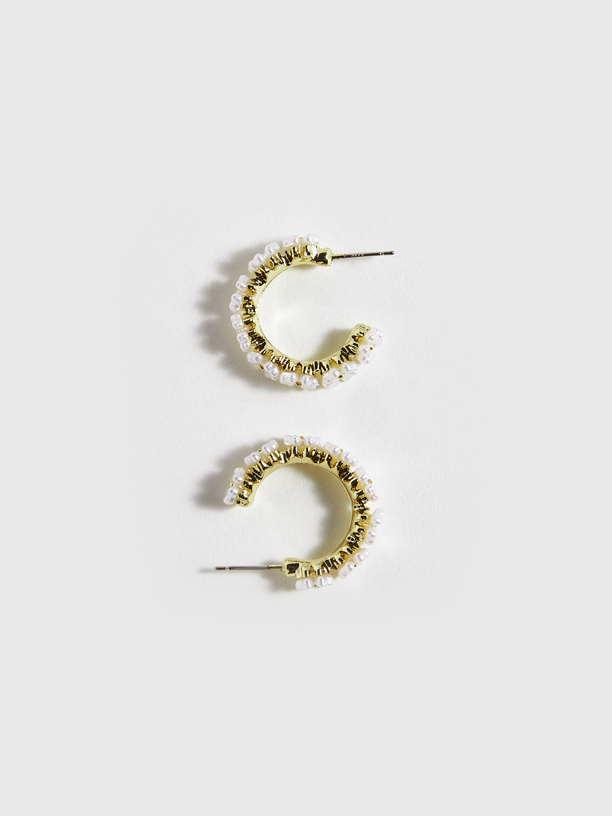 Boucles d'oreilles créoles en forme de coquillage