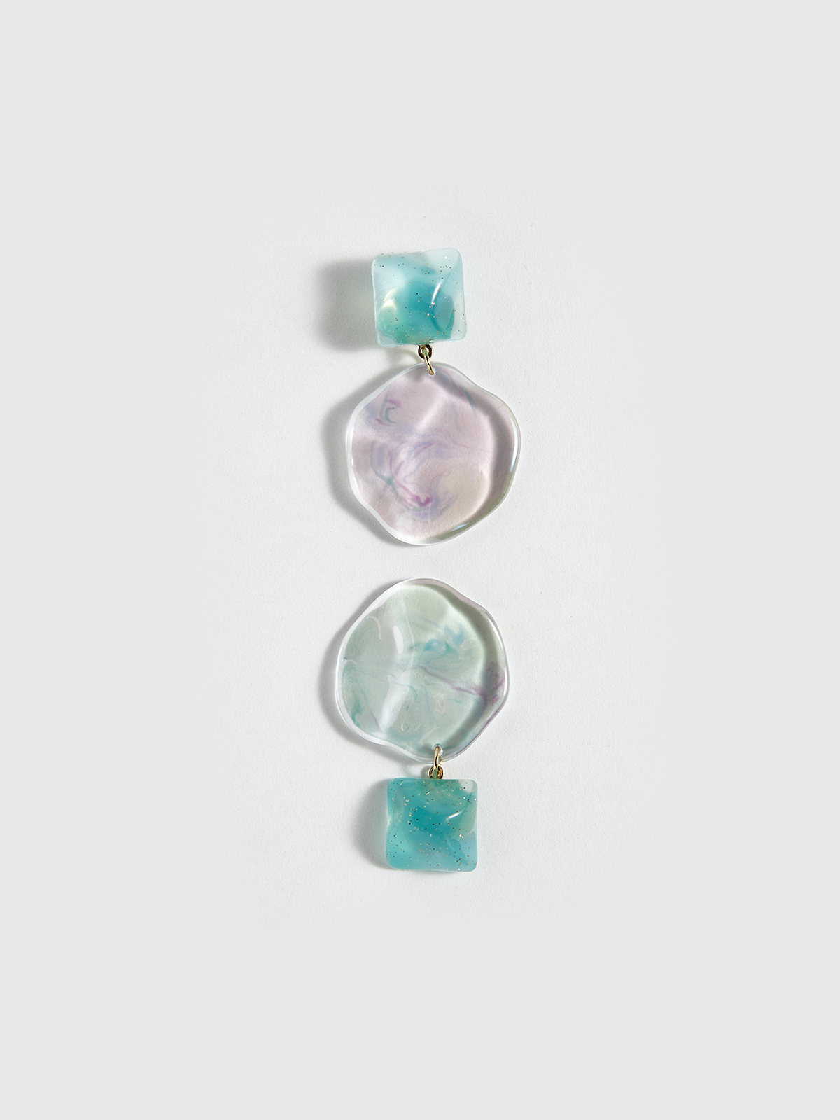 Boucles d'oreilles disque géométrique ondulé transparentes