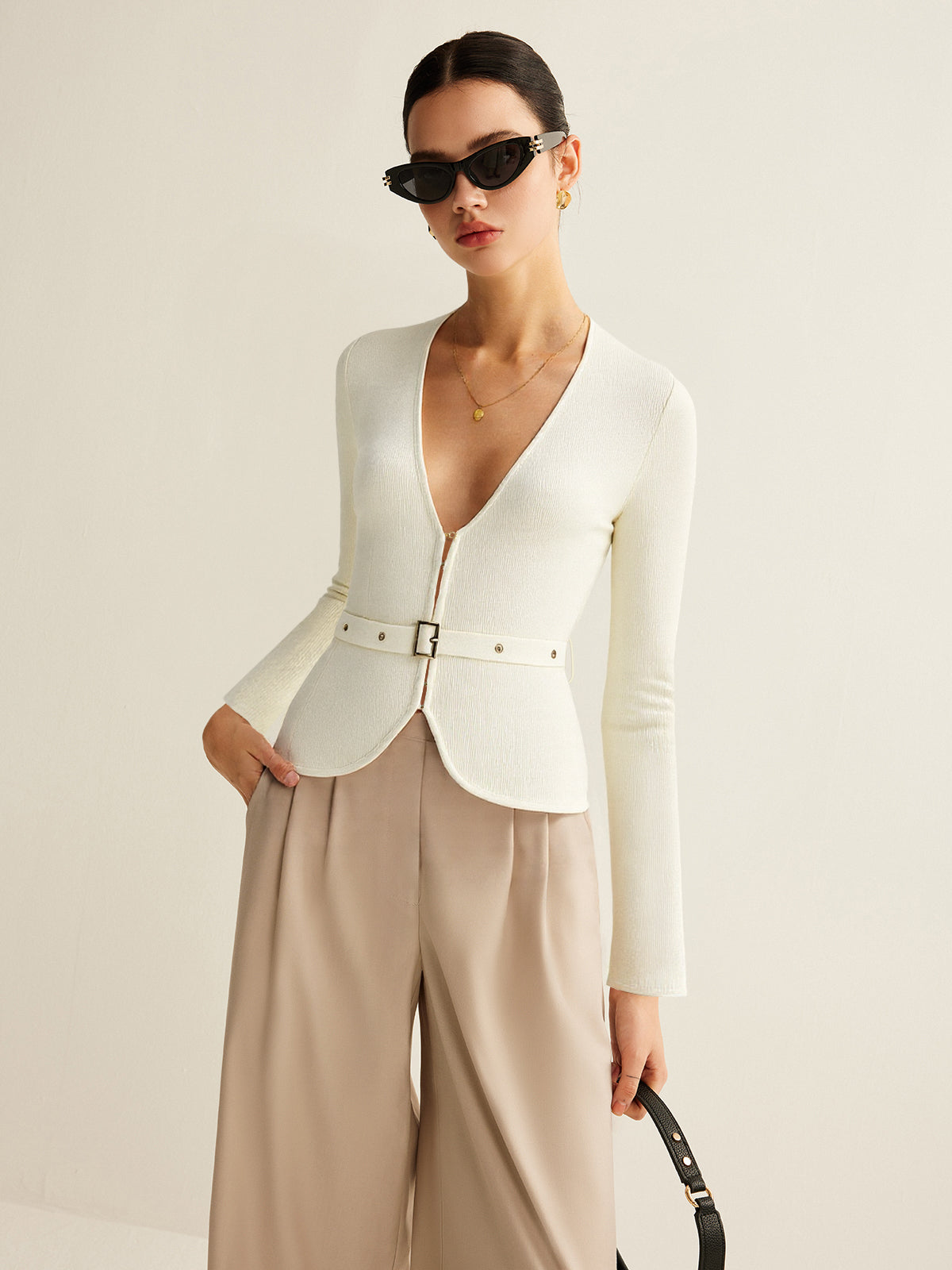 Gilet en maille ceinturé à col en V