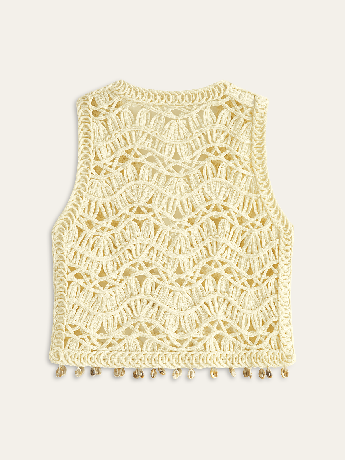 Gilet en crochet orné de coquillages