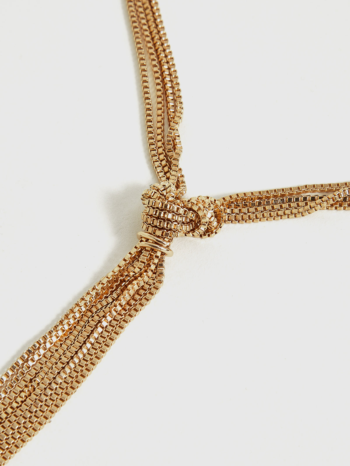 Goldene geknotete Y-Halskette