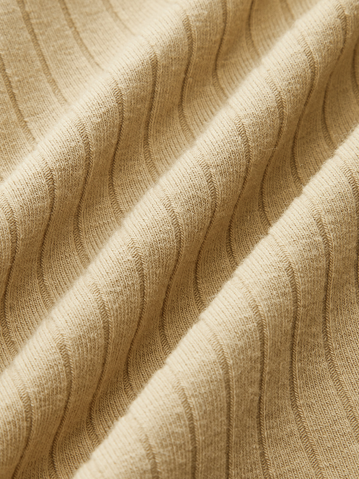 Haut en maille à manches longues et devant torsadé côtelé