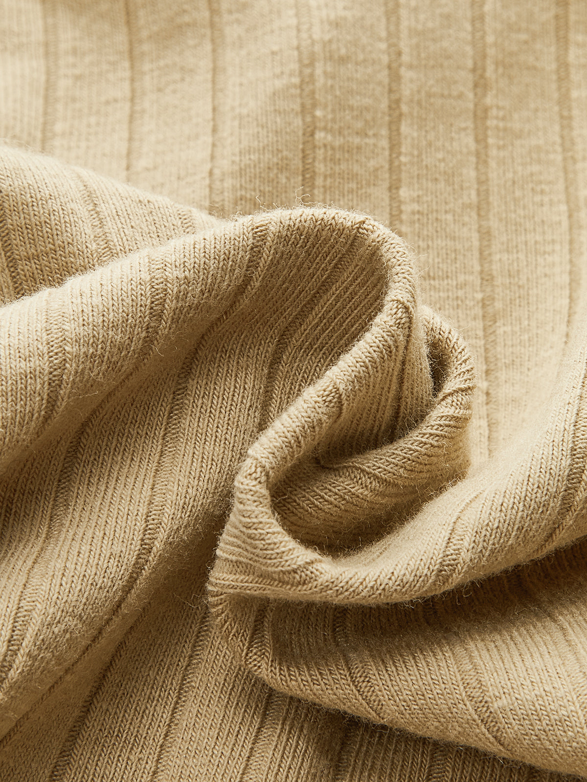 Haut en maille à manches longues et devant torsadé côtelé