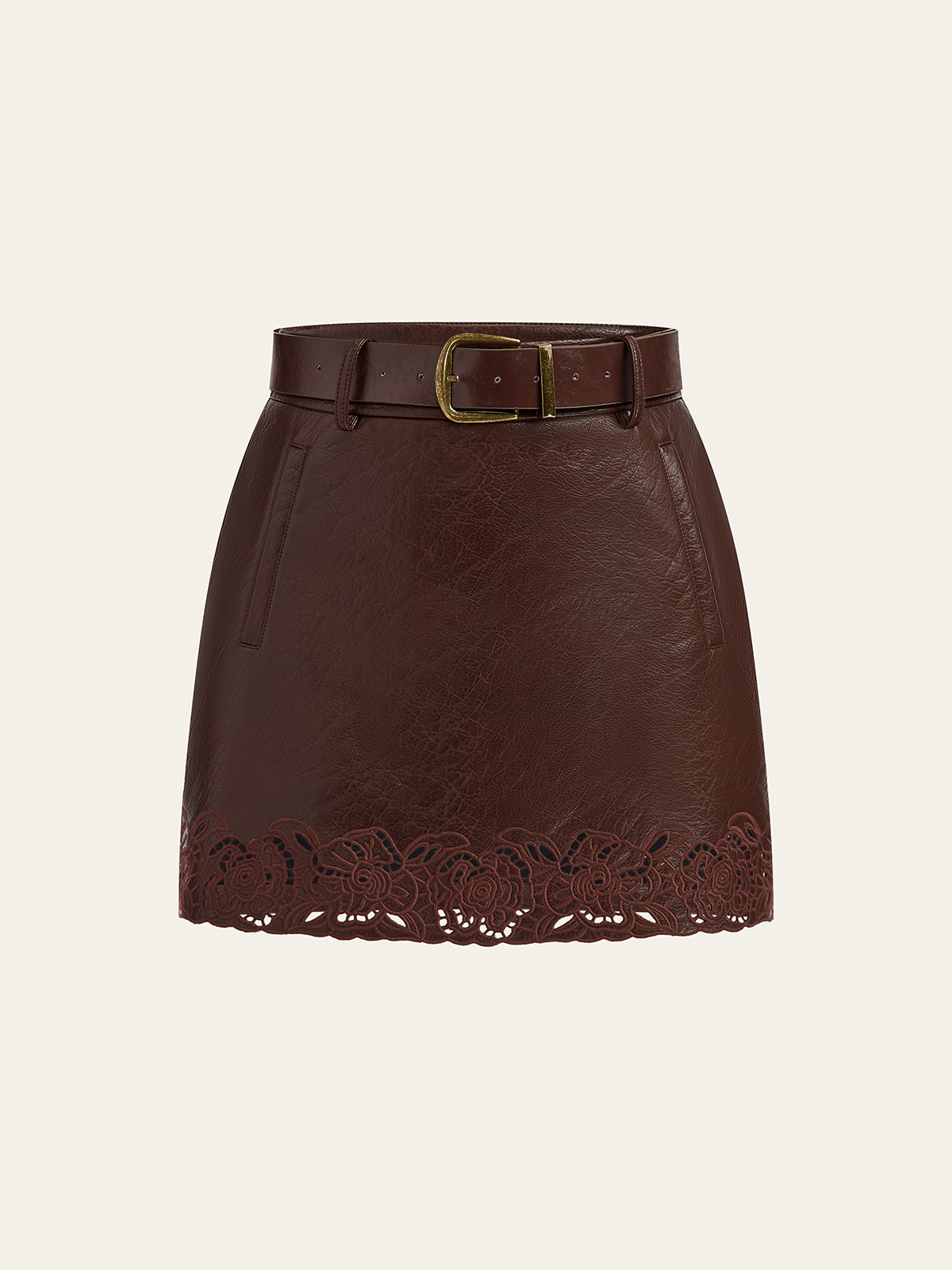 Mini-jupe en similicuir avec garniture jacquard et ceinture