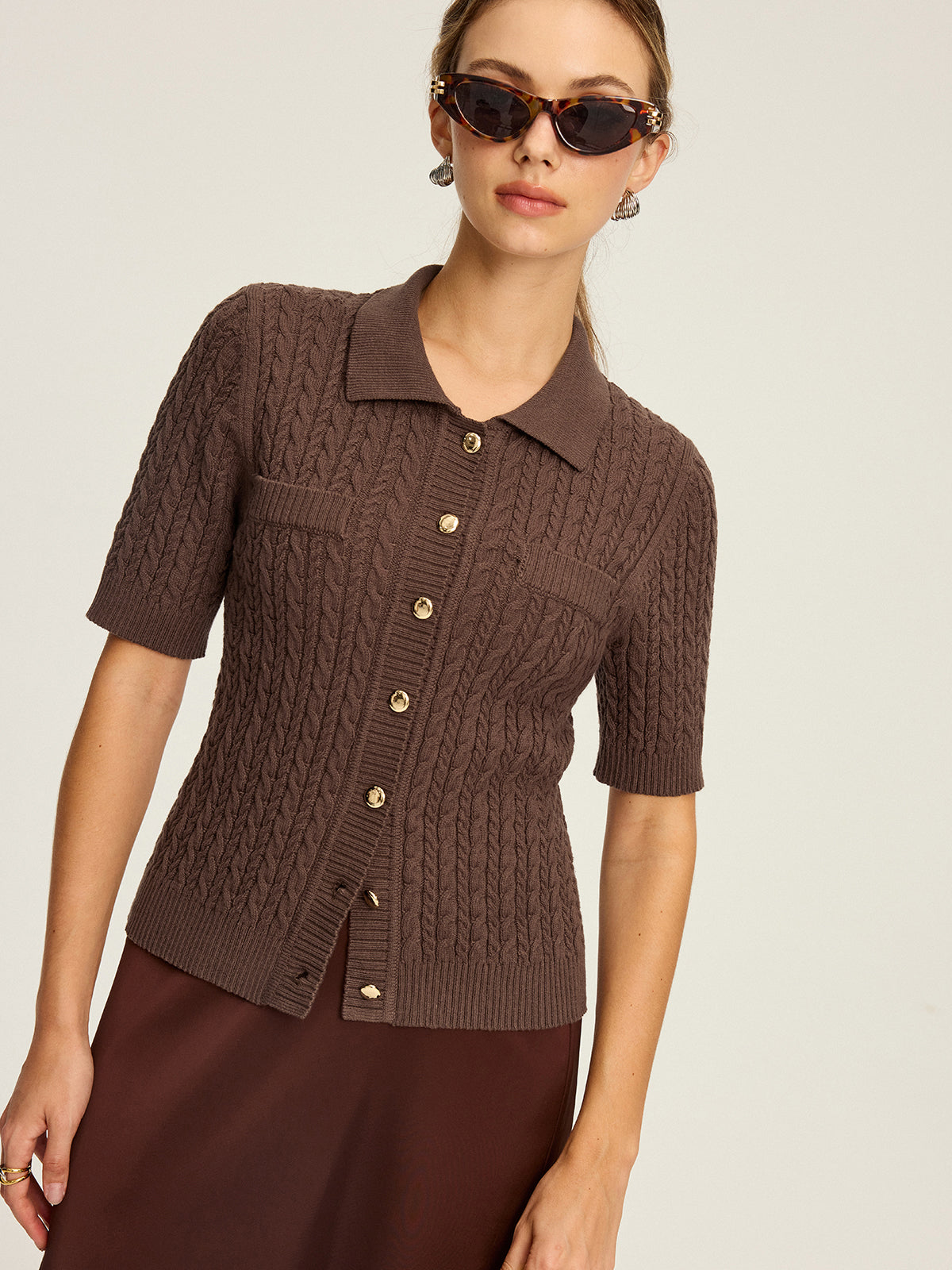 Haut boutonné à manches courtes en tricot torsadé