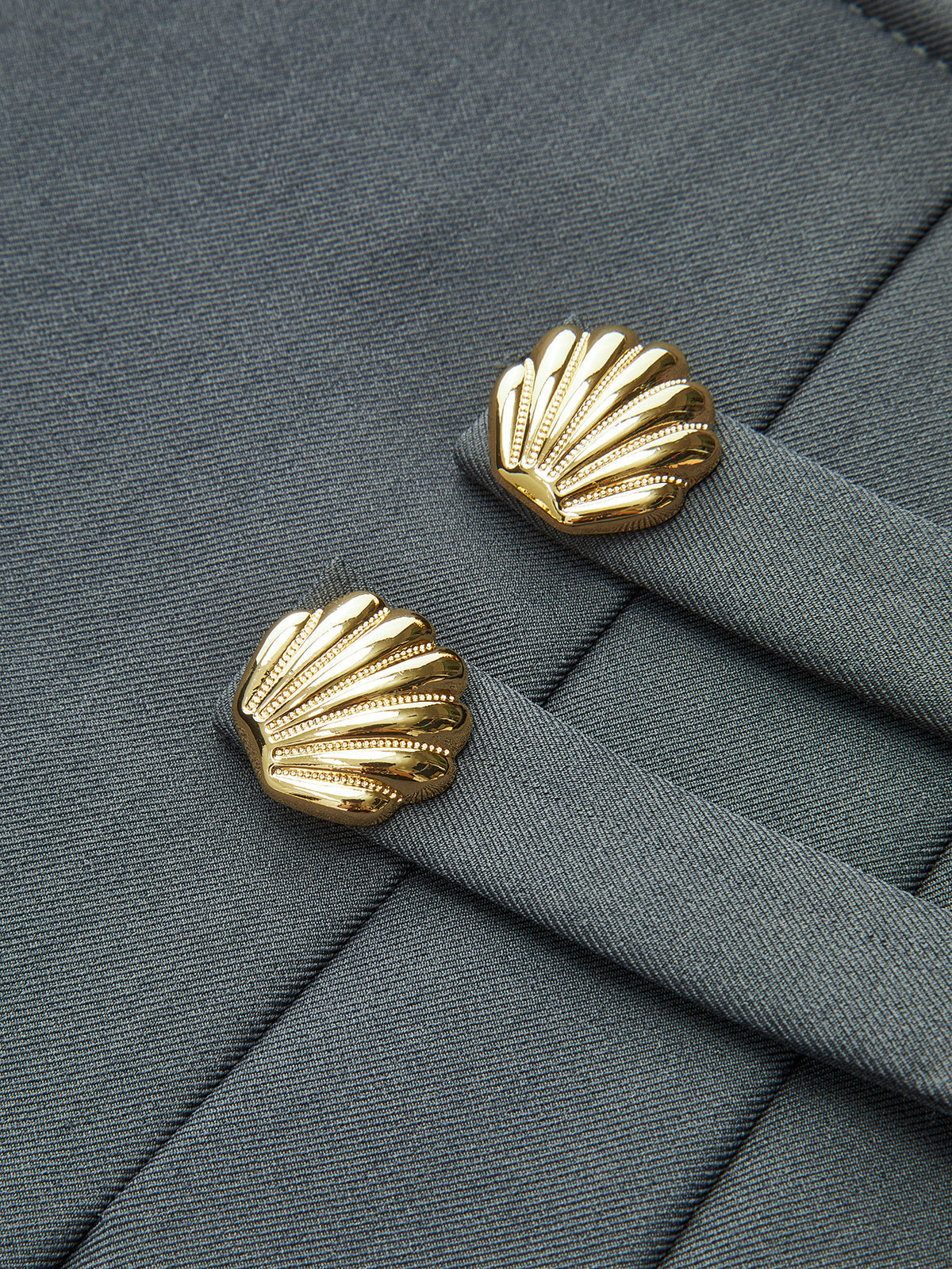 Plissierter Minirock mit Metalldetails