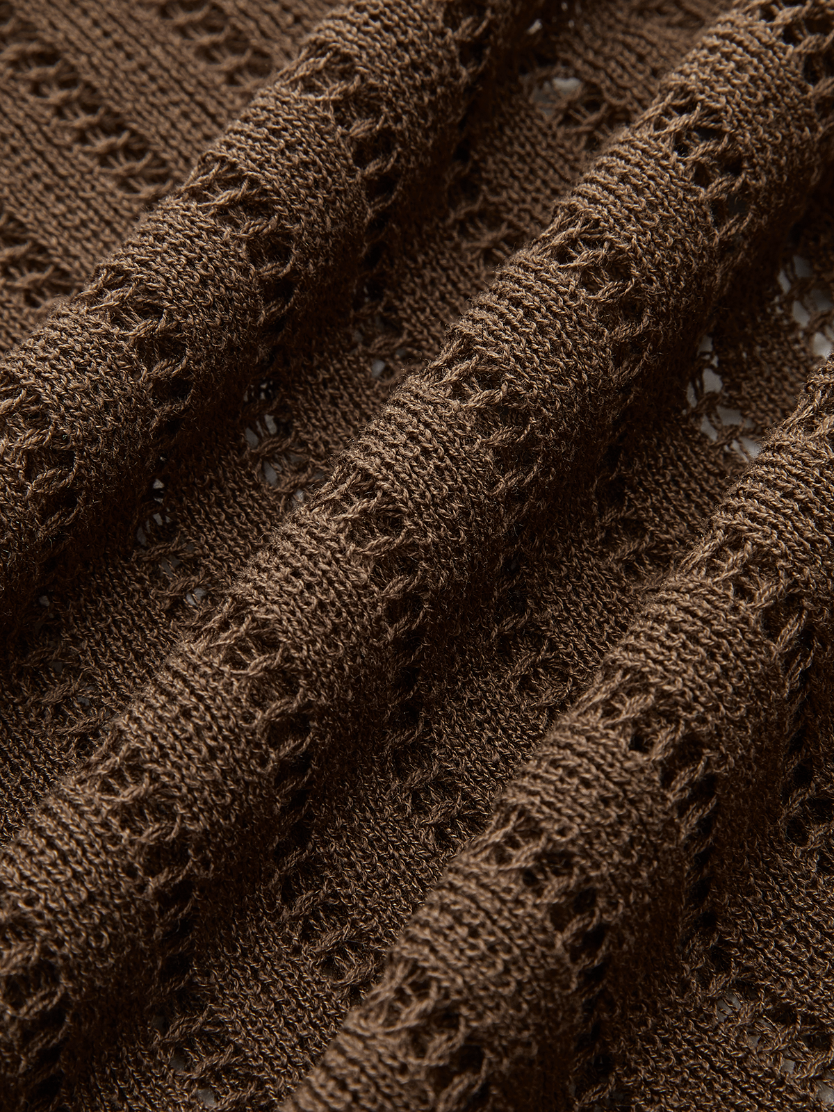 Strickjacke mit Polokragen und Bindedetail vorne