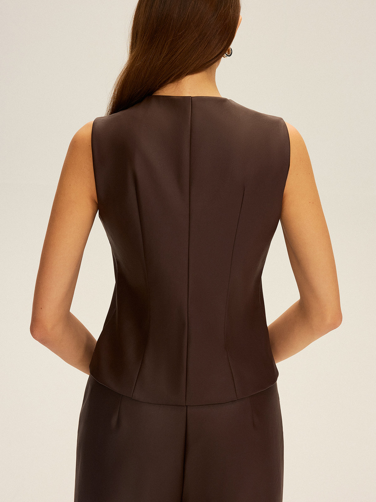 Gilet sans manches à boutons en similicuir
