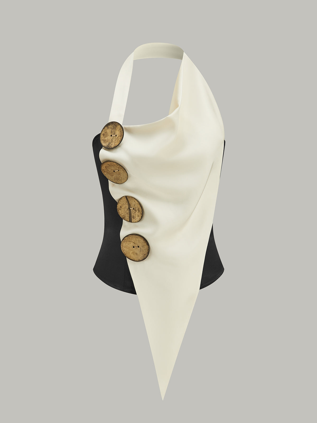 Haut dos nu asymétrique à gros boutons