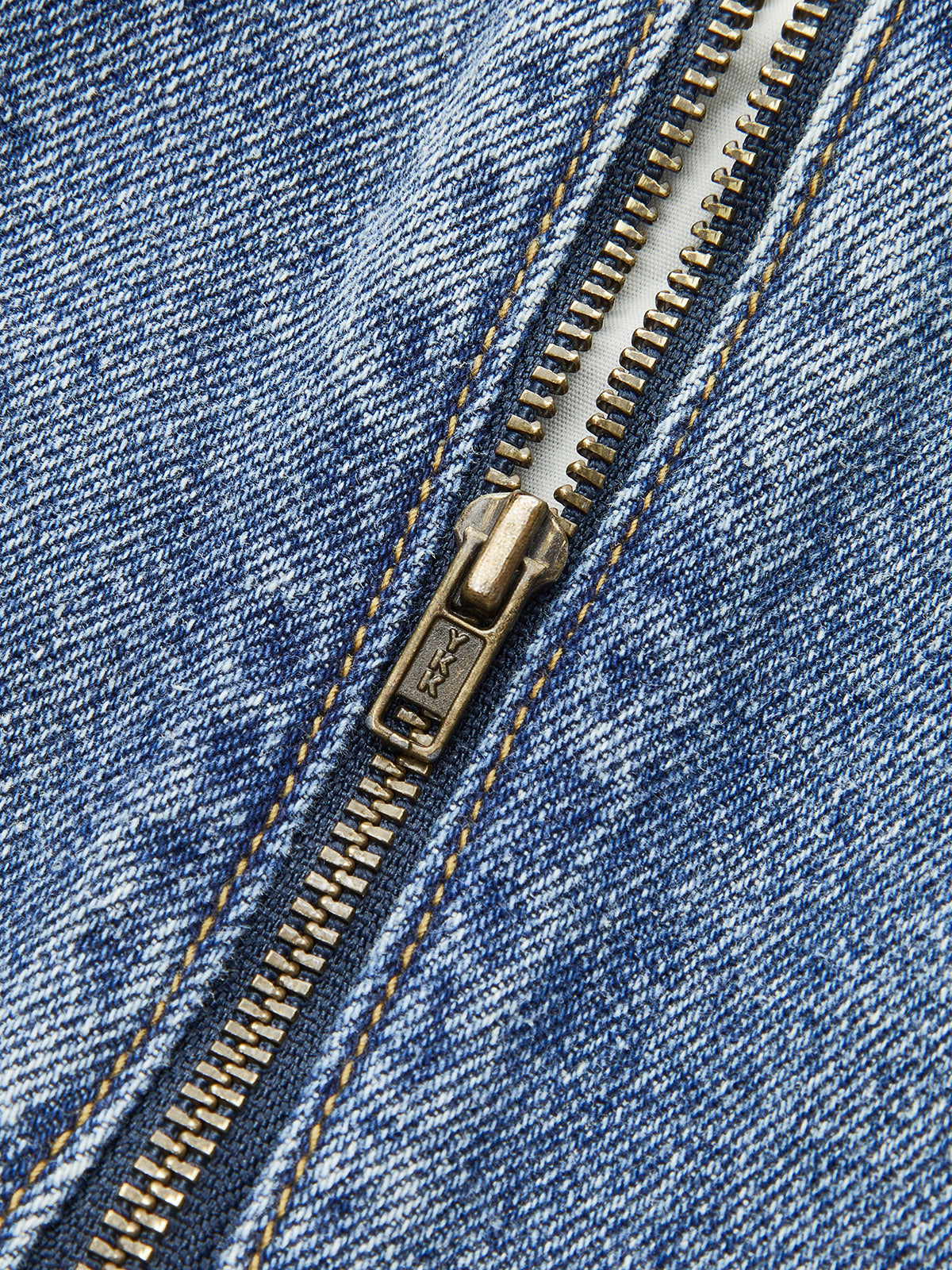 Mini-jupe plissée en jean taille mi-haute
