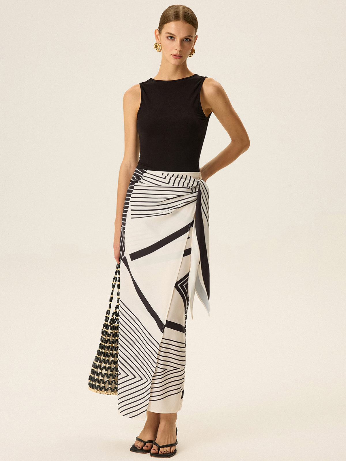 Ensemble top sans manches et jupe portefeuille imprimée