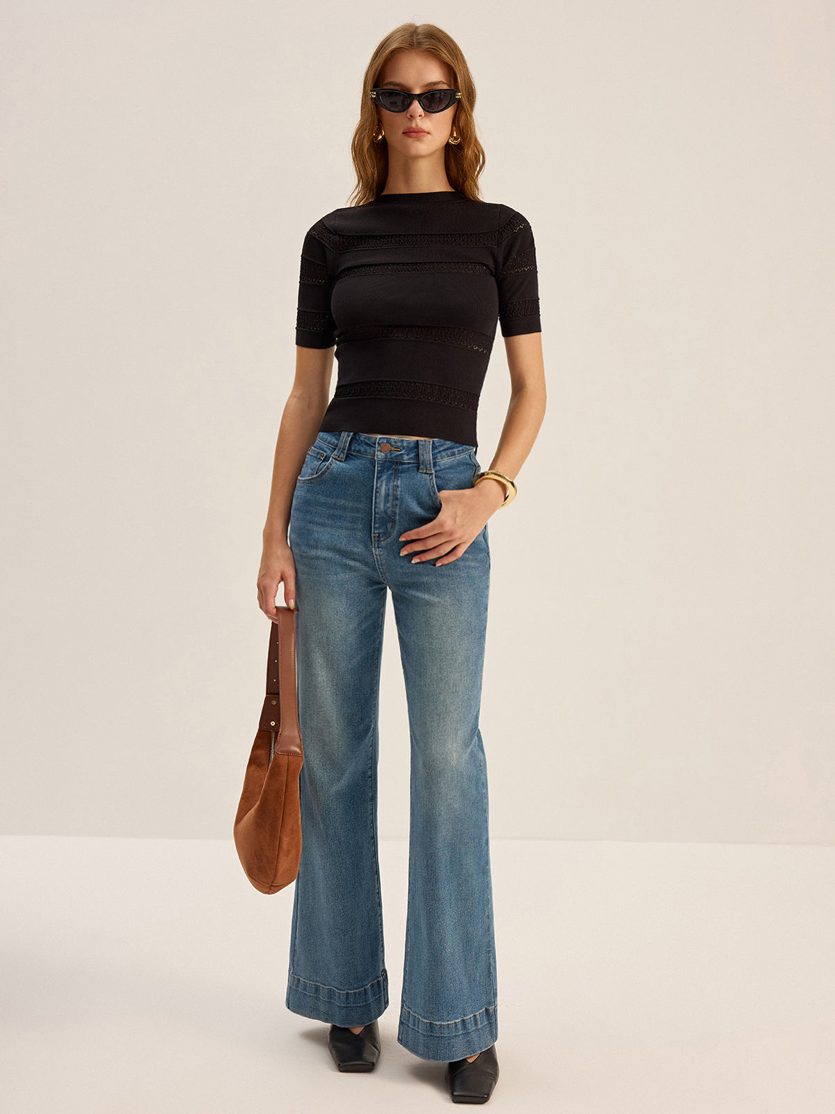 Stricktop mit Häkeldetails