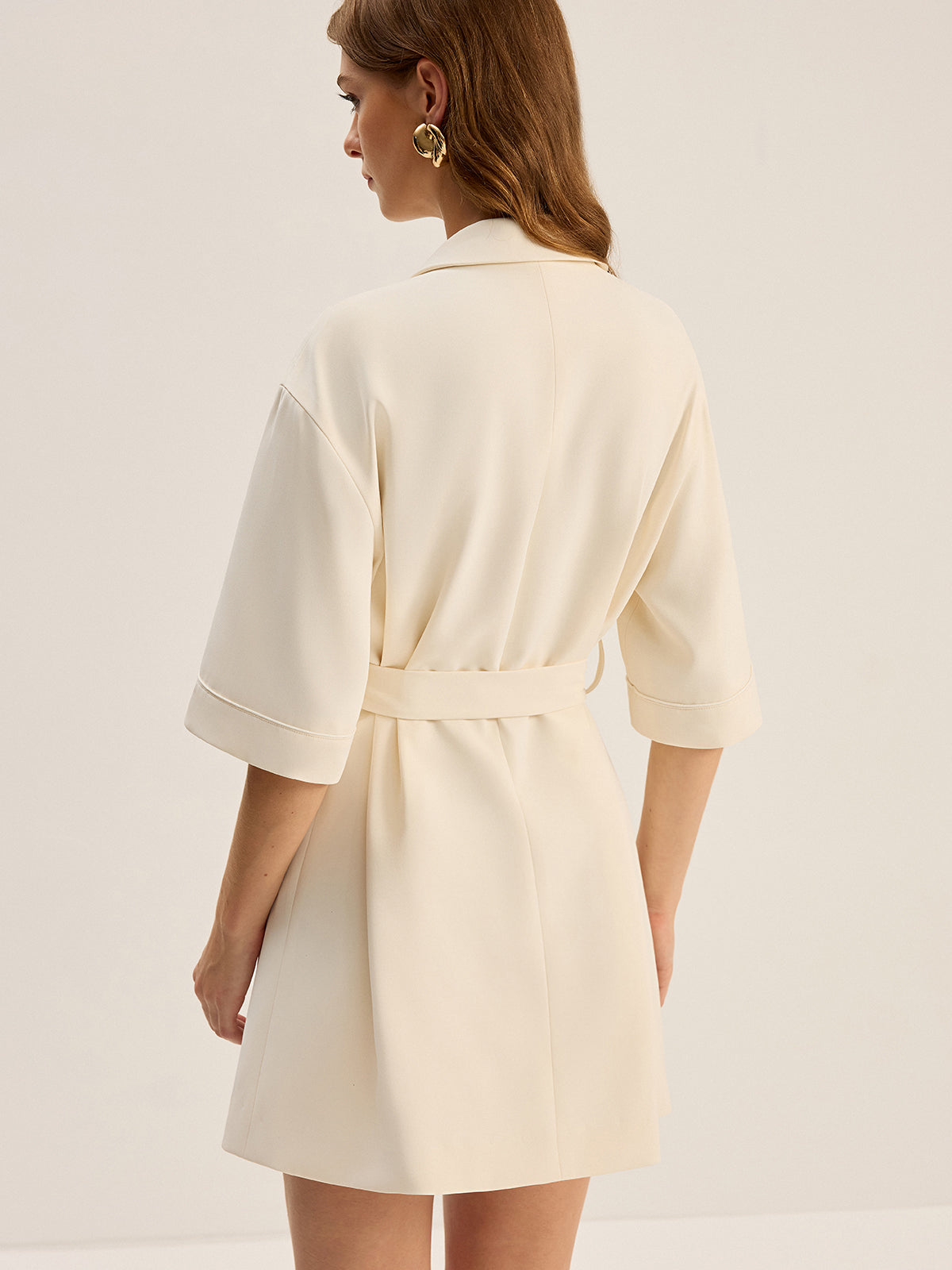 Robe blazer ceinturée à poches