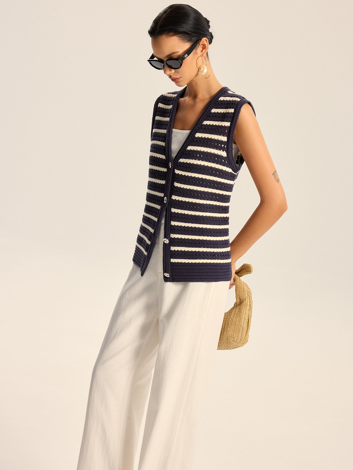 Gilet boutonné en tricot rayé