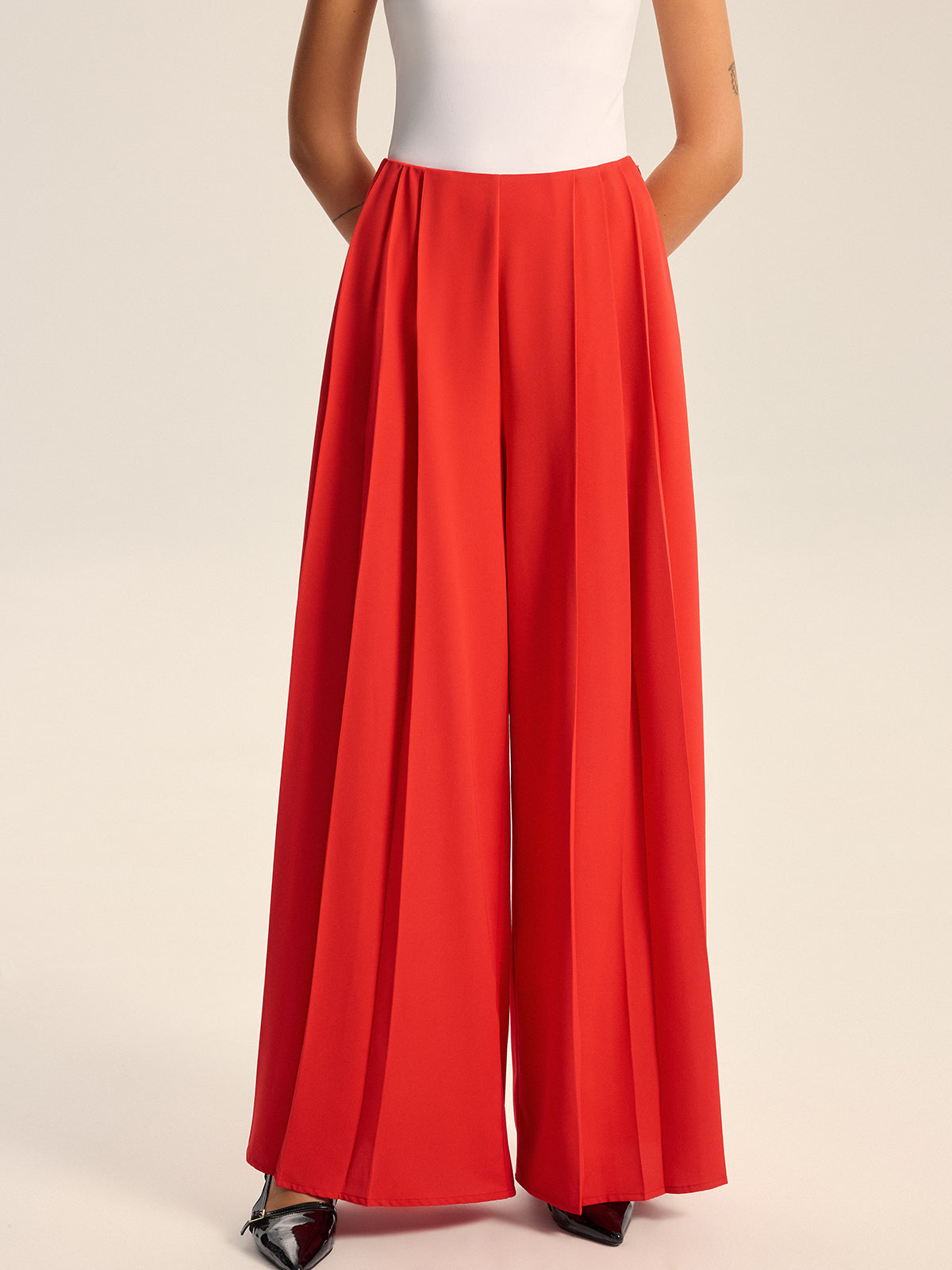 Pantalon plissé ample taille mi-haute