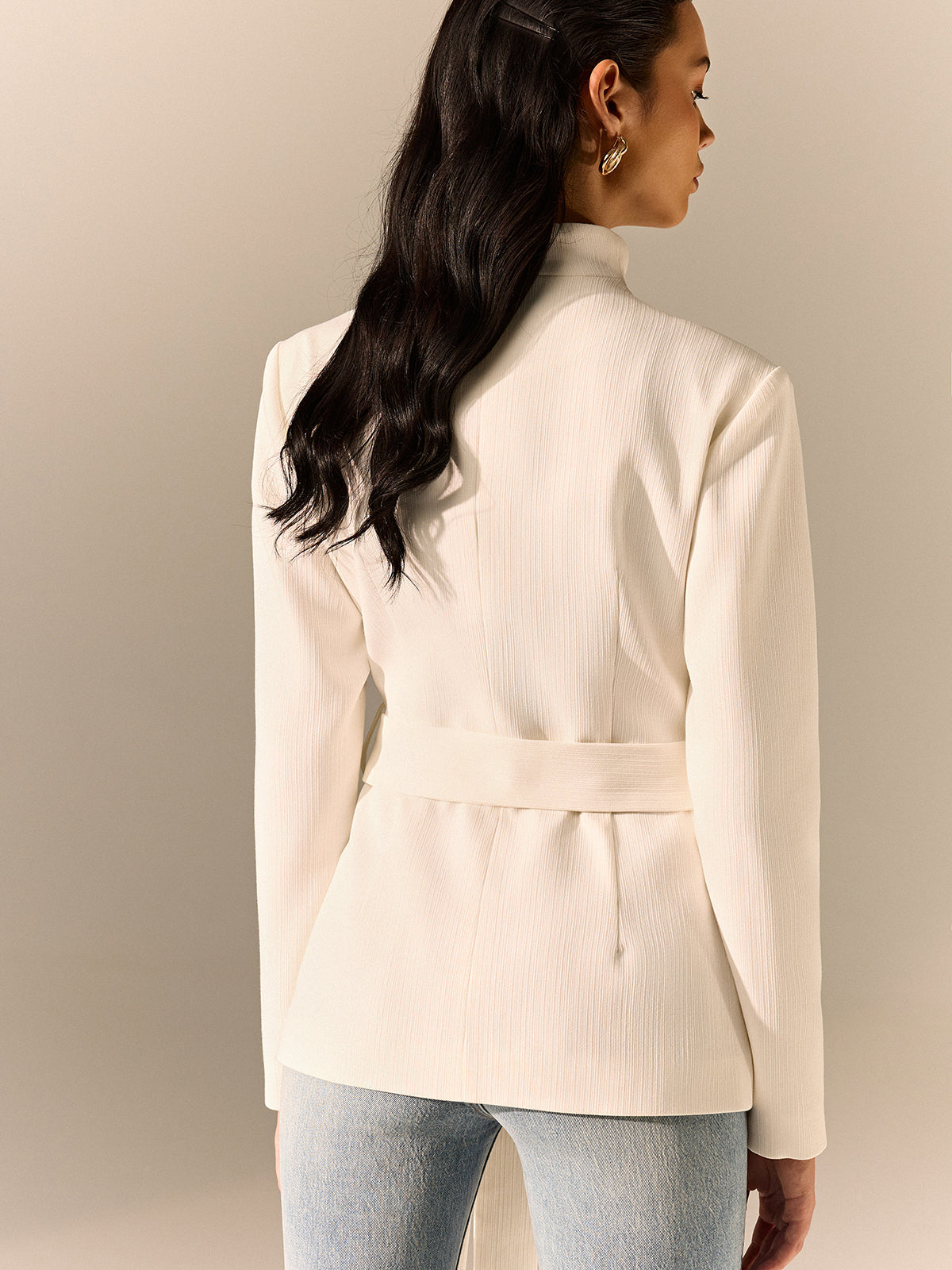 Blazer à manches longues avec col montant et ceinture