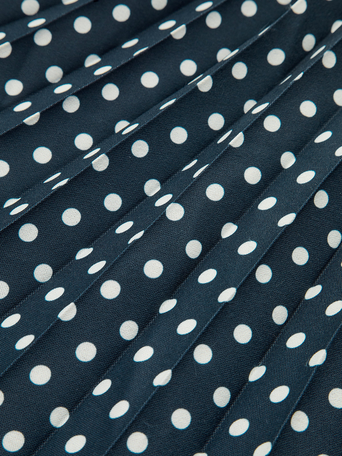 Robe midi à pois et à bretelles licou avec ceinture