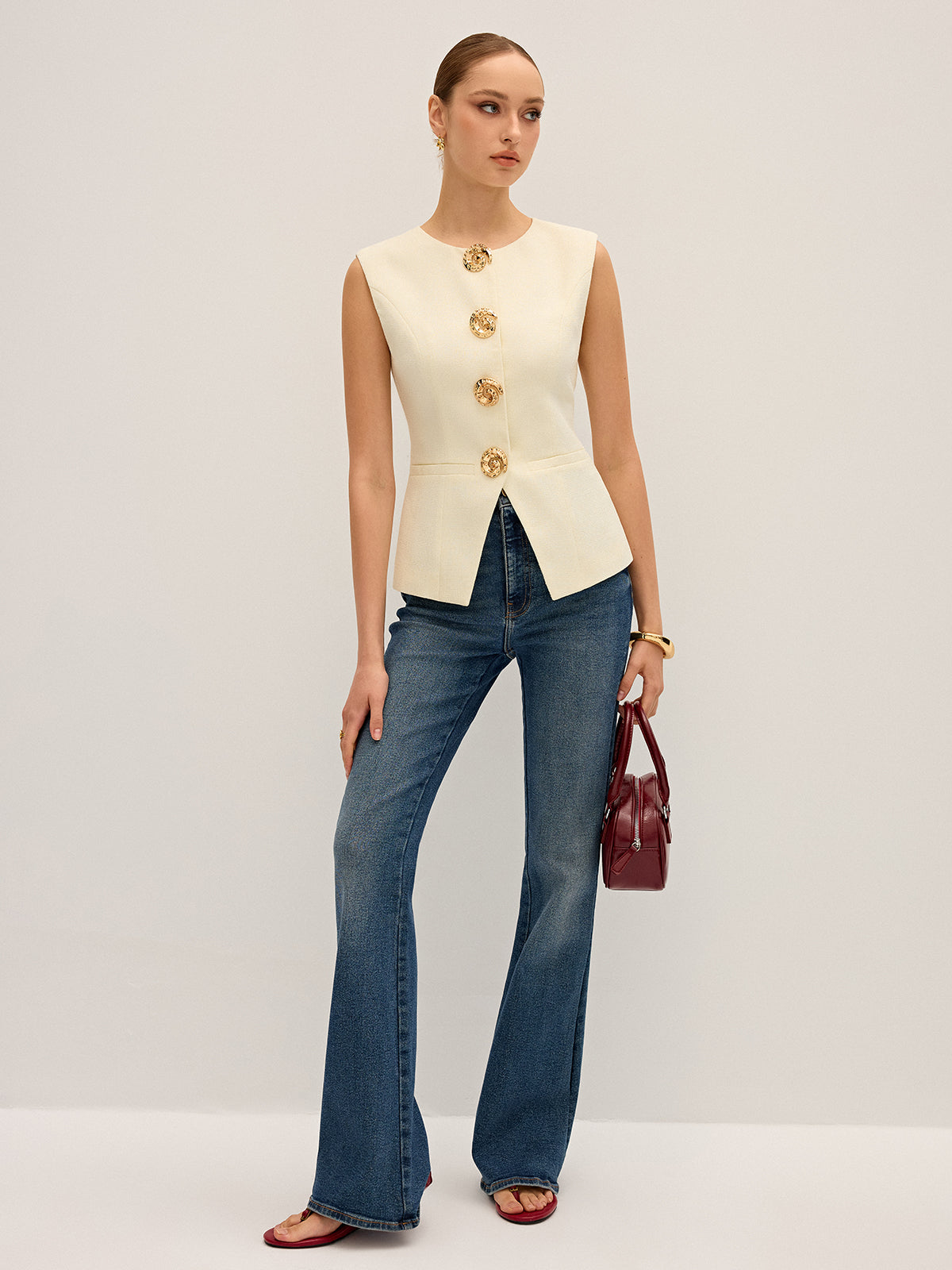 Gilet sans manches à détails métalliques