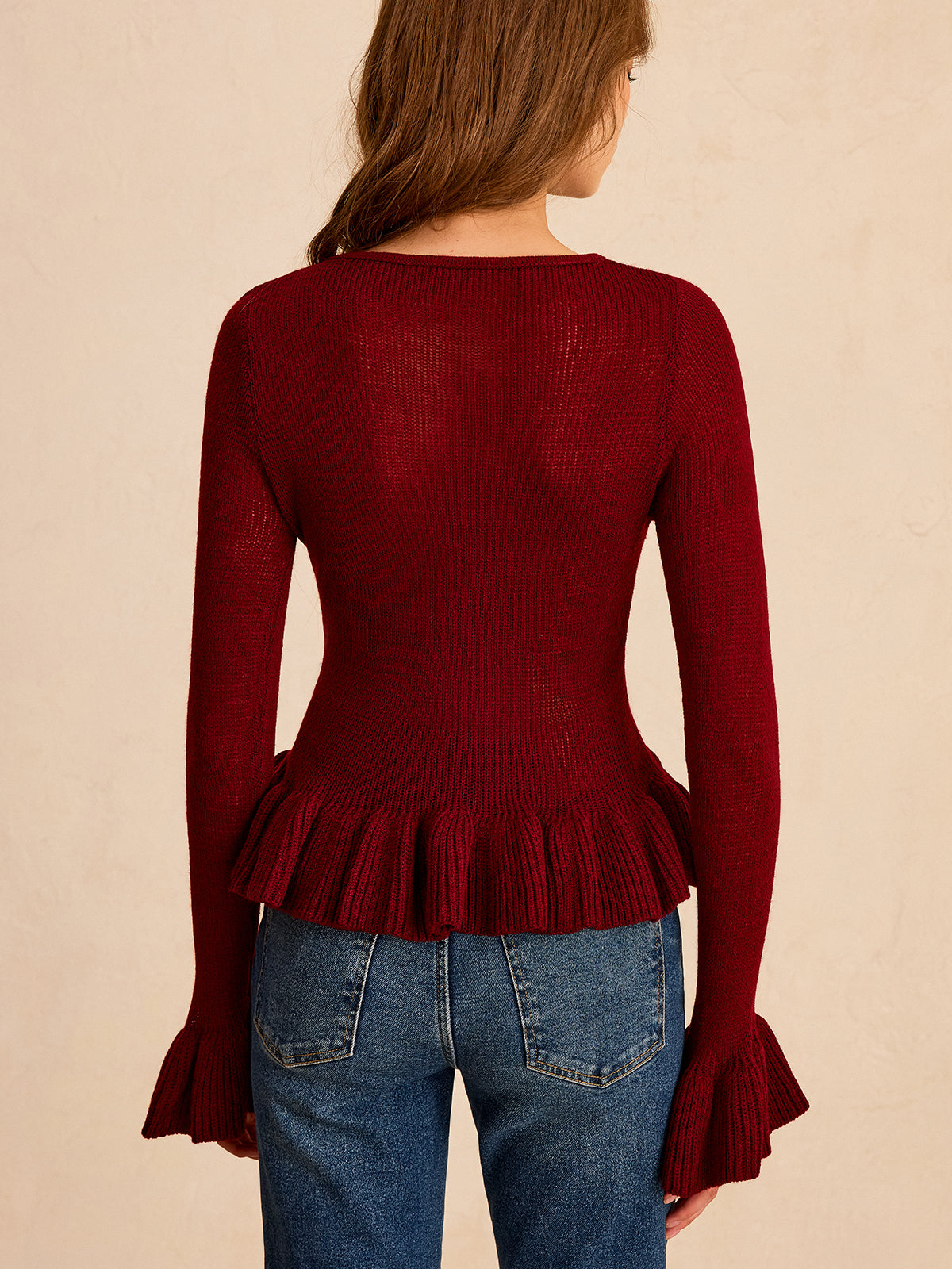 Metal Detail Ruffled Hem Knit Top