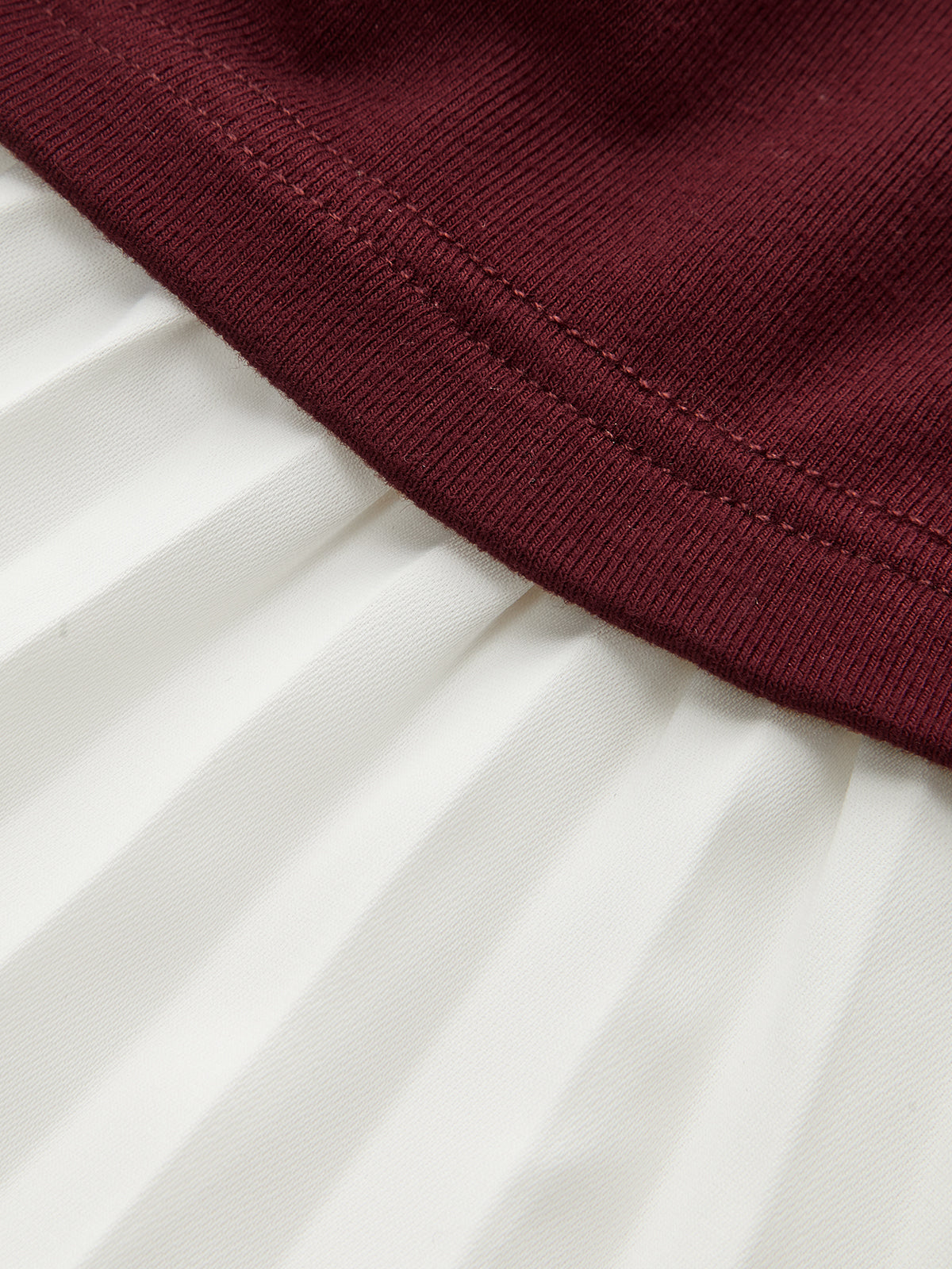 Contrast-Paneled Pleated Peplum T-Shirt