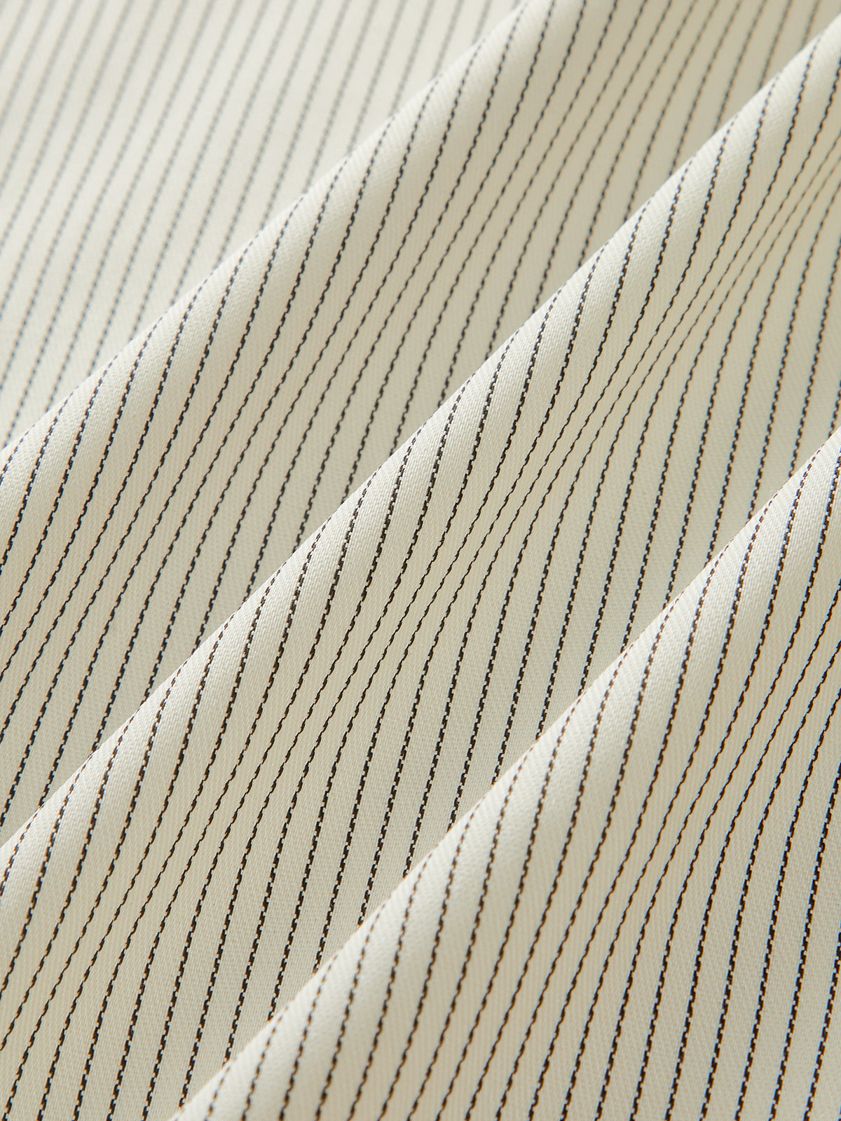 Haut asymétrique rayé à nouer sur le côté