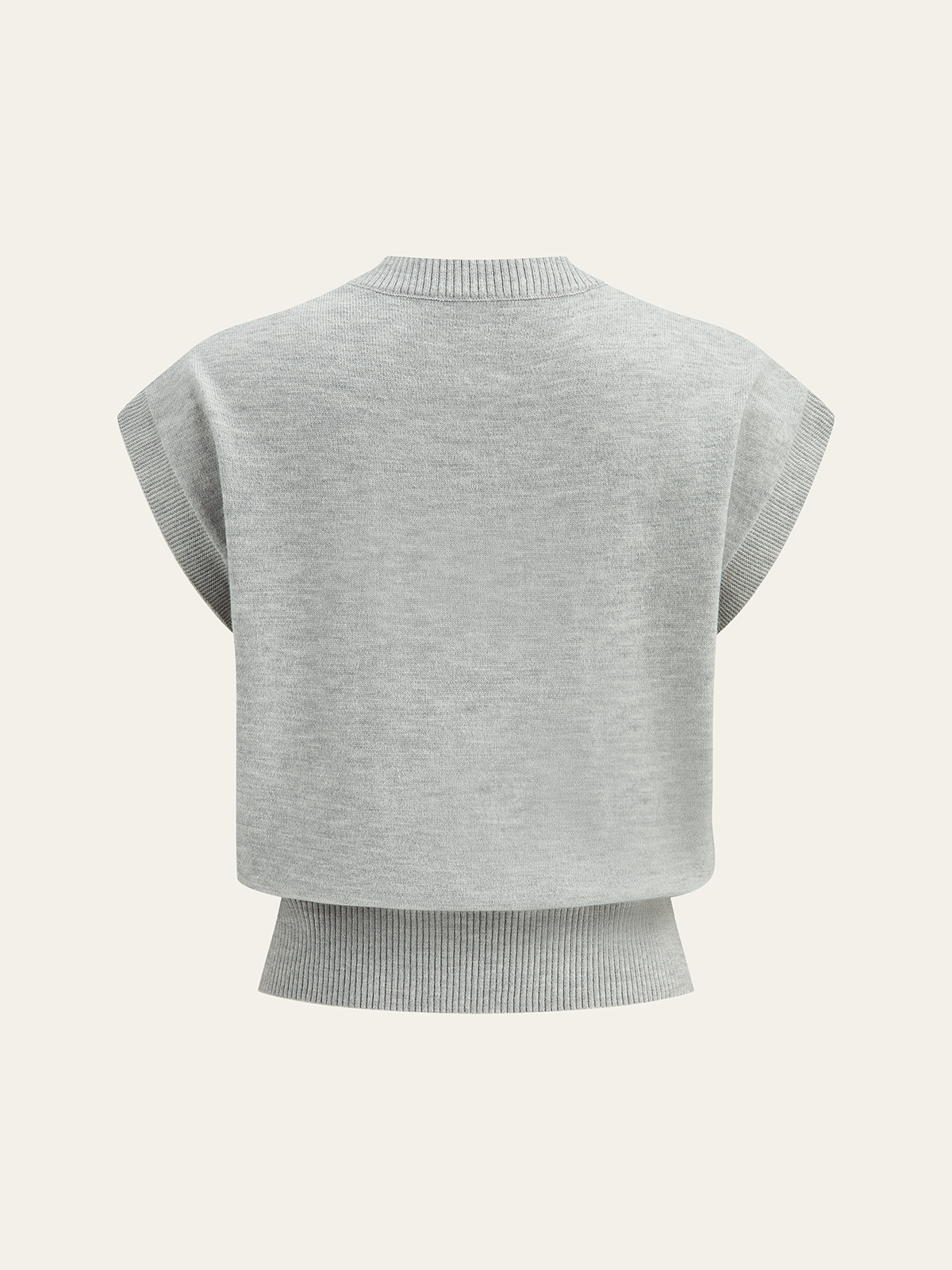 Haut en maille à manches courtes et applique florale