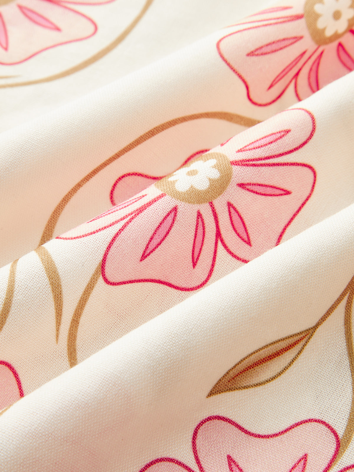 Robe longue dos nu à imprimé floral et col en V