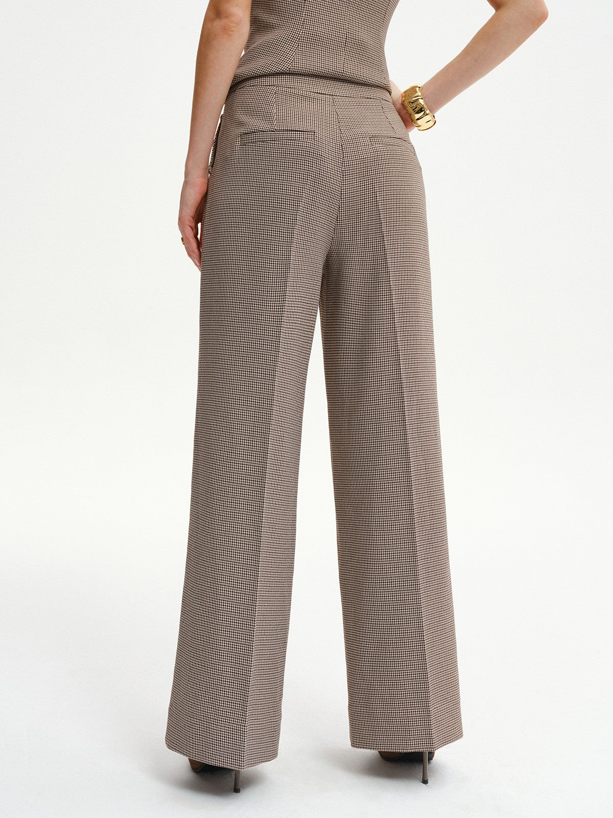 Pantalon mi-taille à motif pied-de-poule et détails métalliques