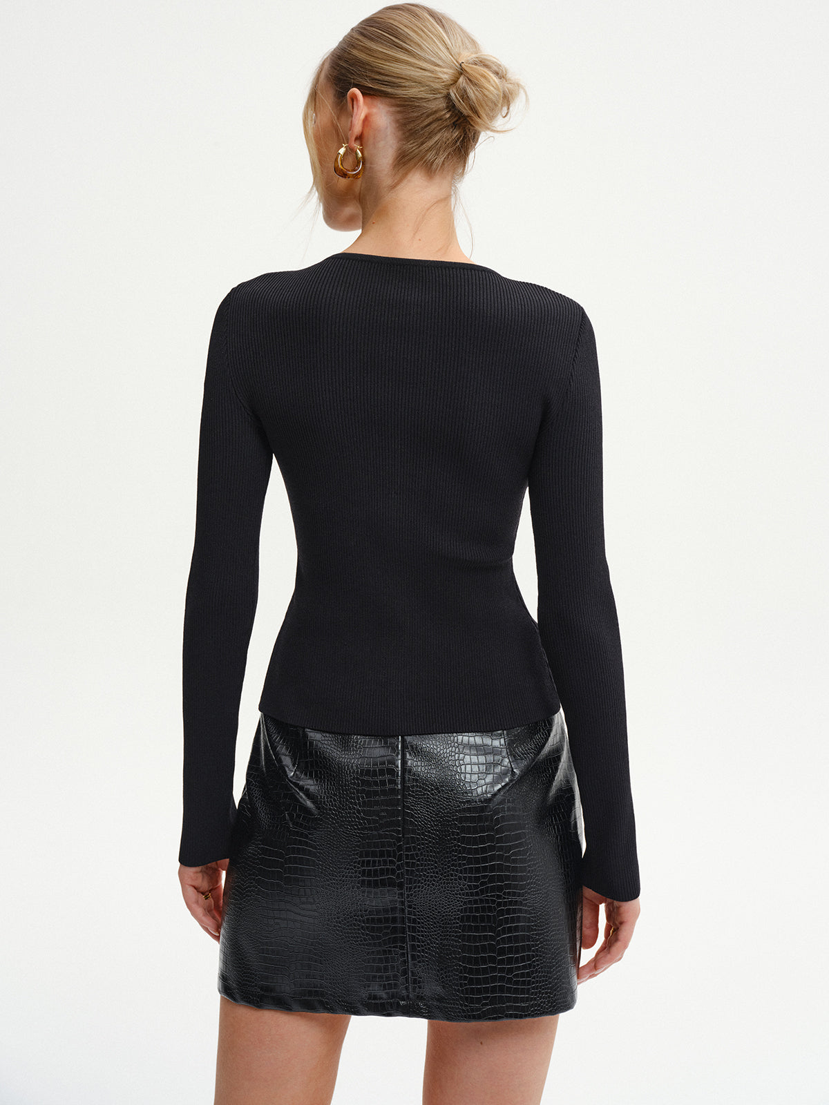 Gilet en maille côtelée à boutons métalliques