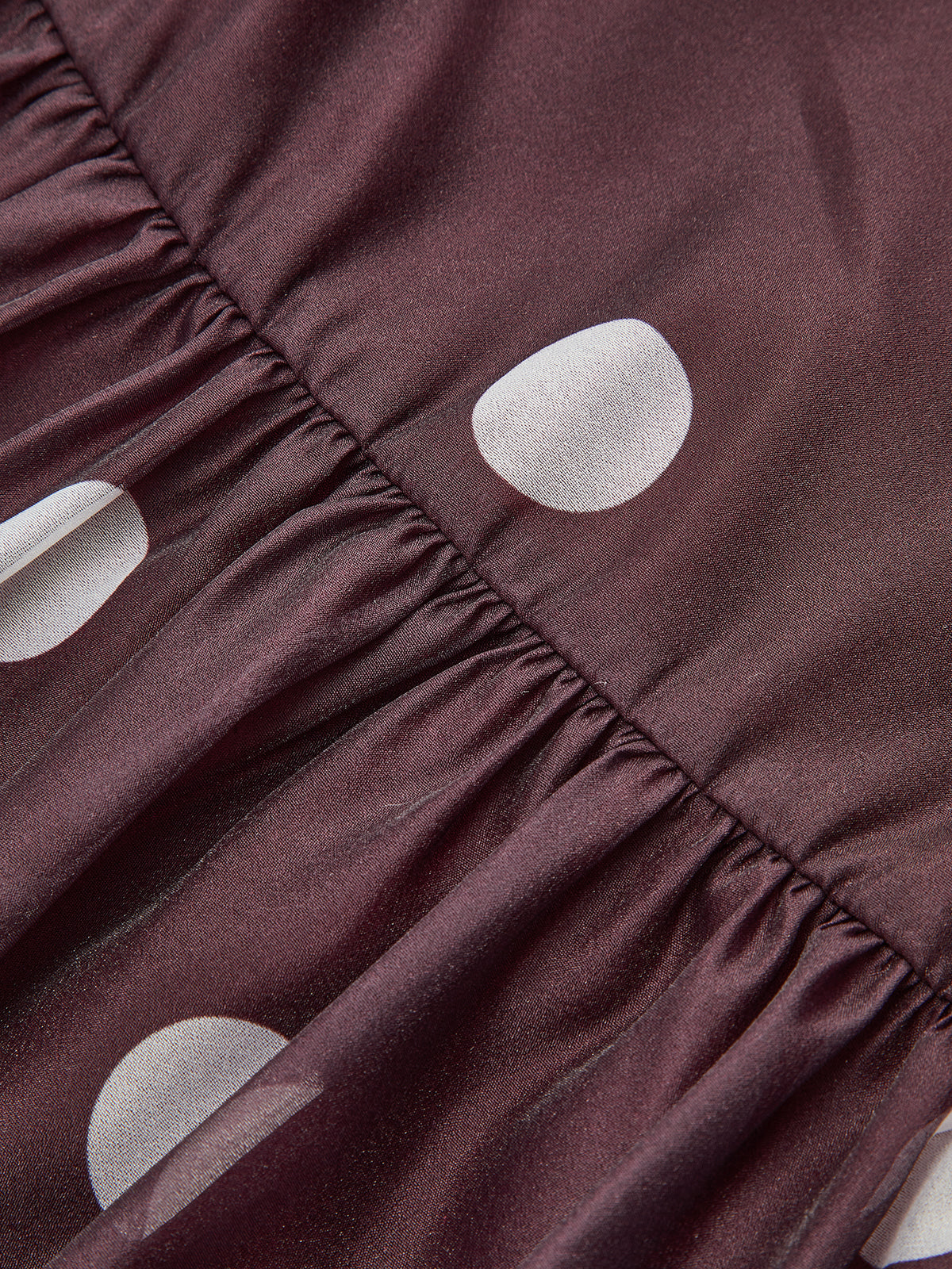 Robe longue en mousseline sans manches à pois