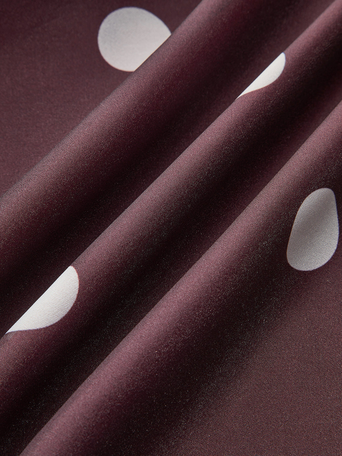Robe longue en mousseline sans manches à pois