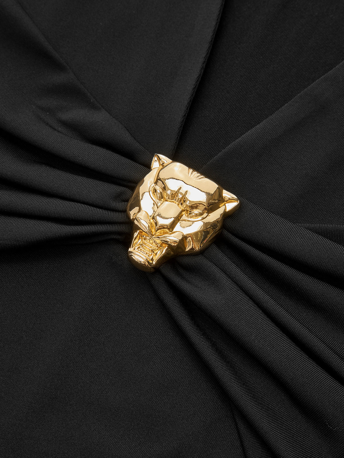 Chemisier à manches longues et col en V orné de détails métalliques