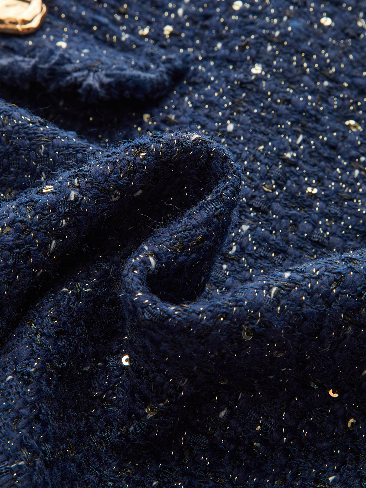 Mini-jupe en tweed à sequins avec poche décorative