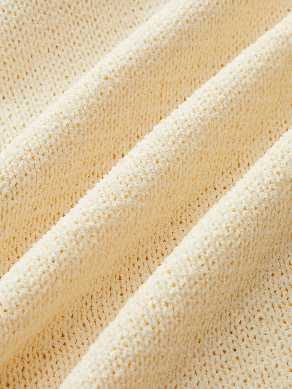 Robe pull à ourlet effiloché et bride en corde tressée