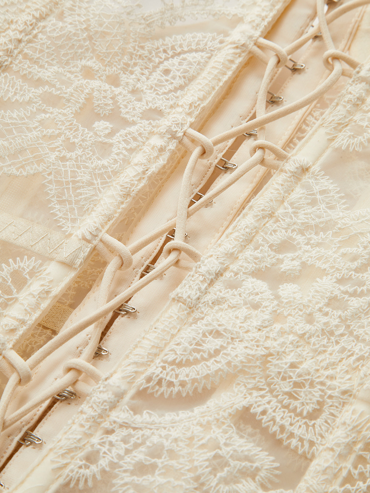 Transparente trägerlose Korsett-Top mit Spitze und Stickerei