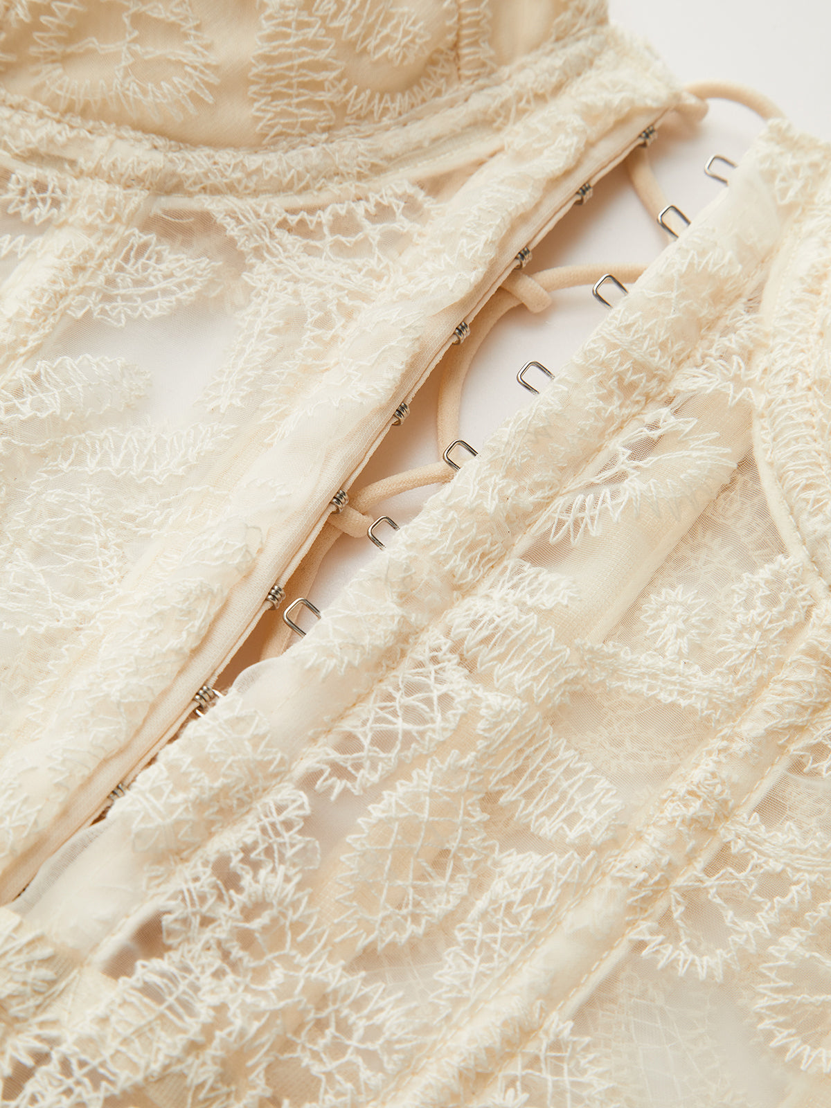 Transparente trägerlose Korsett-Top mit Spitze und Stickerei