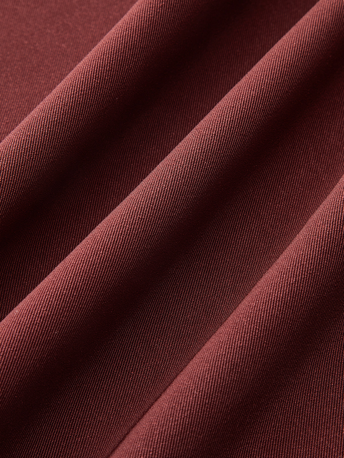 Gefaltete weite Hose mit Gürtel