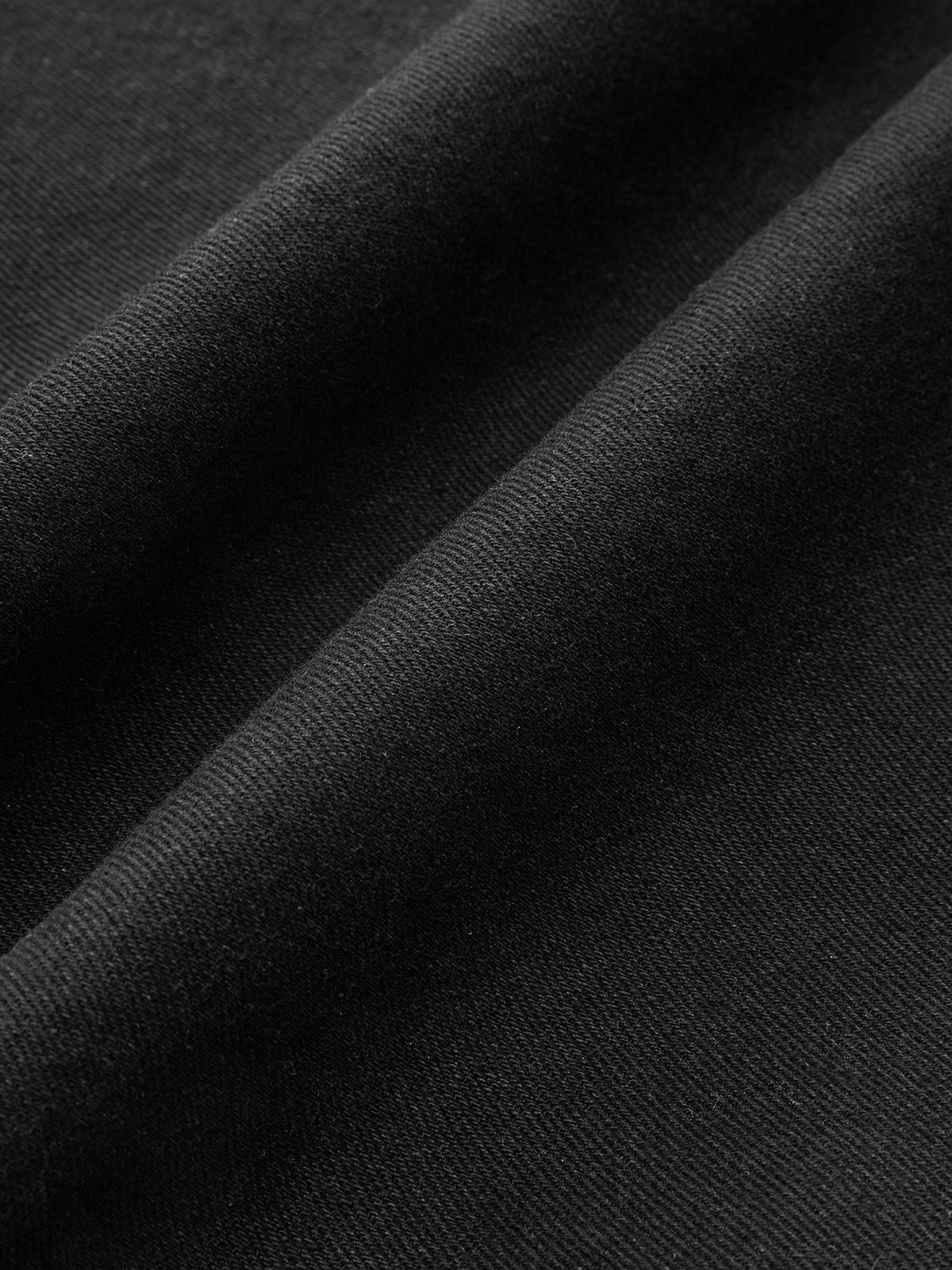 Pantalon en denim asymétrique taille mi-haute