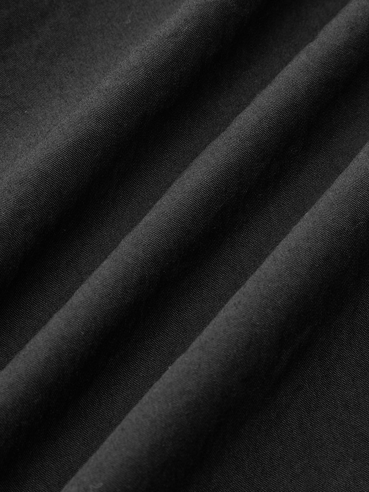 Oberteil mit ausgestellten Ärmeln und asymmetrischem Wickeldesign